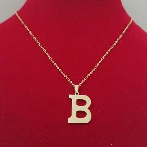 B gold pendant